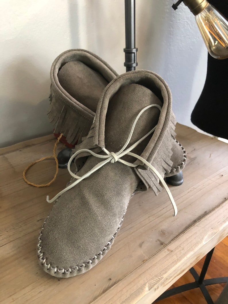 Inspired by a fusion of Native American and western cultures, these handcrafted moccasins are made completely of leather image 2