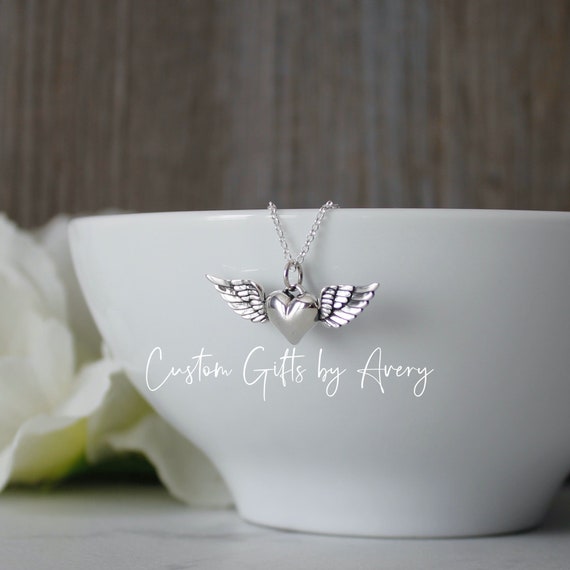 Winged on sale heart necklace