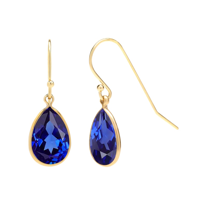 Blue sapphire earrings featuring 12x8mm pear-shaped, lab-created navy sapphire stones in open bezel settings, elegantly suspended from French wires. Drop length is 1.1mm