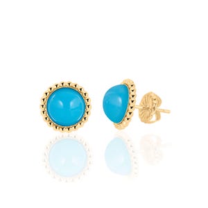 May include: A pair of gold earrings with a blue turquoise stone set in a beaded bezel.