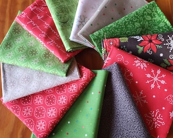 New Christmas with Smoky gray fat quarters fabric bundle. Bright red and green prints and grays. Poinsettias, snowflakes, dots words