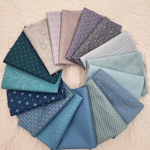 Ocean blue and Teal fat quarters fabric bundle of 16 stunning prints. Beautiful hues of blue, teal green,gray and aqua.  Quality cotton.