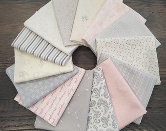 Sweet little pink fat quarters fabric bundle of 14 quality cotton prints.  Soft pink, cream, white and gray coloring.  Perfect for all