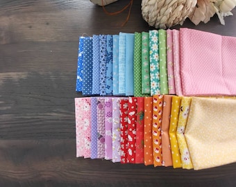 Reproduction 30's fat quarters fabric bundle of 30 assorted quality cotton prints.  A rainbow of coloring in beautiful little prints and dot