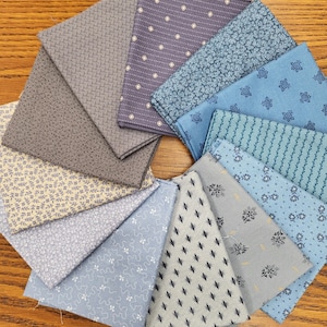 Blueberry blue color fat quarters fabric bundle of 12 quality cotton prints.  Civil War, floral plaid and more. Beautiful collection.