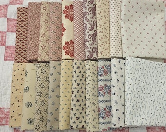 Americana shirtings fat quarters fabric bundle of 20 quality cotton prints.  Cream to tan backgrounds with red and blue accent coloring.