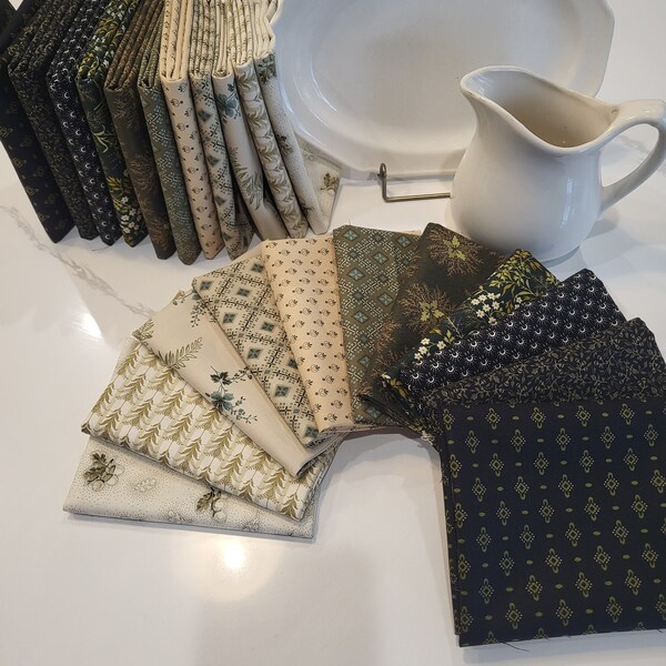 onyx and army green fat quarters fabric bundle of 11 exquisite prints. A rich coloring of oatmeal, teal, army green, moss and black.