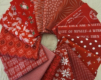 Cheerful Christmas red fat quarters fabric bundle of 15. A sweet selection of fun prints all in shades of red. Perfect for the holiday