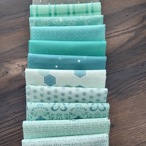 Mint, pistachio fat quarters fabric bundle of 12 quality cottons. A mix of dinos, hexies, solids, plaids.   Perfect for modern, baby boy +