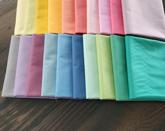 An array of color fat quarters fabric bundle.  Quality cotton. 20 beautiful shades of color. Rainbow. Andover solids. Modern, fresh, fun