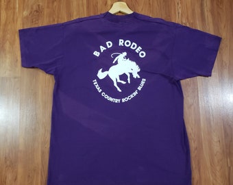 Vintage 1980s Bad Rodeo Texas Country Rockin Blues Adult XL purple shirt heavy screen print spellout Fruit of the Loom Best single stitch US