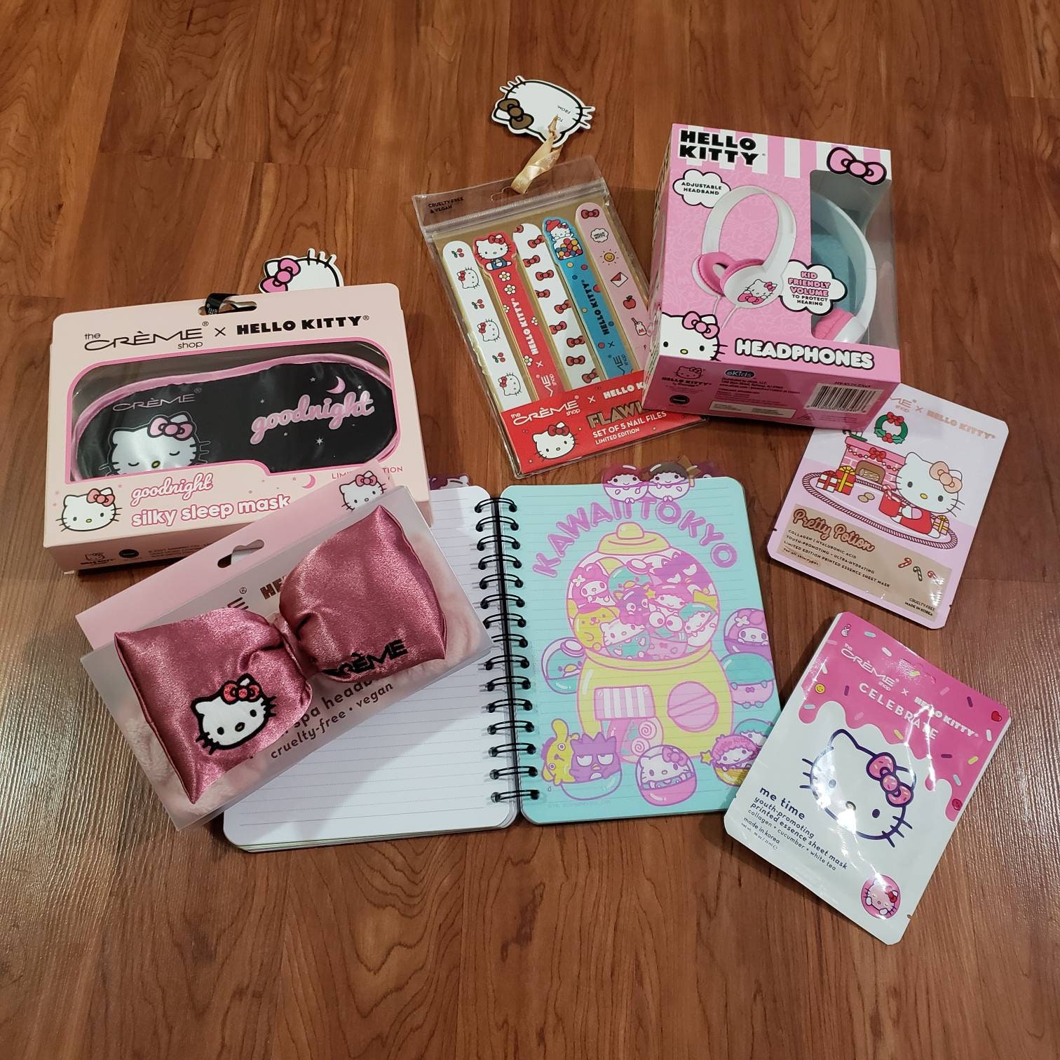 Lot of 7 New Hello Kitty by Sanrio X Creme Silky Sleep Mask Face Mask  Notebook Nail Files Headband Headphones Limited Edition Gift 