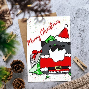 Cartolina di Natale: divertente Babbo Natale Black Pug che scarta il regalo di Natale / Biglietto di auguri "Buon Natale" per le festività natalizie