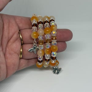 Bracelet enroulé à mémoire de forme papillons et abeilles