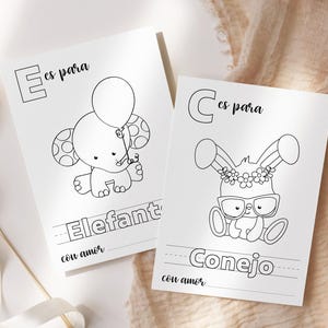Könnte beinhalten: Zwei Schwarz-Weiß-Malvorlagen mit Tierillustrationen. Eine Seite zeigt einen Elefanten, der einen Ballon hält, mit dem Wort "Elefant" darunter. Die andere Seite zeigt ein Häschen mit Brille, mit dem Wort "Conejo" darunter.