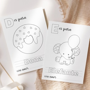 Könnte beinhalten: Zwei schwarz-weiße Malvorlagen. Eine zeigt einen Donut mit herzförmigen Streuseln, das Wort "Dona" und den Satz "con amor". Die andere zeigt einen Elefanten, der einen Ballon hält, das Wort "Elefante" und den Satz "con amor".