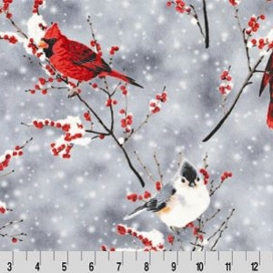 May include: A wintery fabric featuring a repeating pattern of red cardinals and a small gray bird perched on branches with red berries against a gray snowy background.