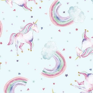 May include: A seamless pattern featuring watercolor illustrations of unicorns and rainbows on a light blue background. The unicorns are pink, purple, and white with gold horns. The rainbows are multi-colored with pink, purple, blue, green, and yellow. The background is scattered with small white stars and pink hearts.
