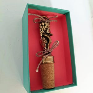 Stopper for the bottle "grape". Brass, natural cork.