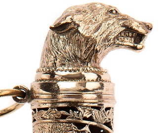The shoe horn is a long &quot;Wolf&quot;, 80 cm. Brass, wood.