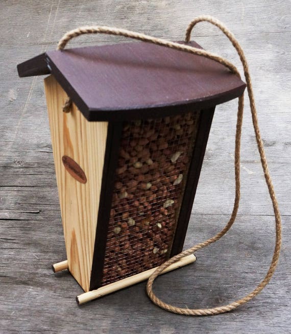Wooden hanging bird feeder Peanut mesh and sunflower seed ...