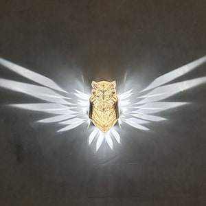 Owl sconce deals
