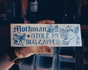 Mothman Stole My Bug Zapper - Funny Cryptid Bumper Sticker | Weatherproof Vinyl Sticker | Cryptid Merch & Gifts