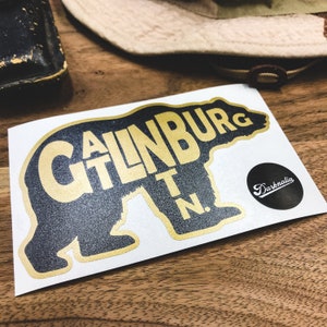 Gatlinburg Tennessee Bear Great Smoky Mountains TN Vinyl Sticker | No Ink Durable Decal | 3 x 5 inch | Matte Black + Metallic Gold