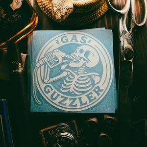 Funny &#39;Gas Guzzler Skeleton Decal – Unique Vinyl Sticker – Perfect for Cars, Trucks, Laptops, and More – Durable 5 inch