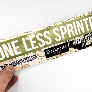 One Less Sprinter Large Bumper Sticker [ Military Green/White 10" x 1.5" ]
