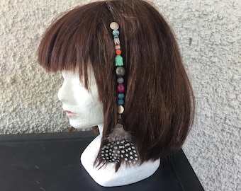 Atebas, trenza boho/hippie/Buda, cuentas africanas, plumas. Hecho a mano.