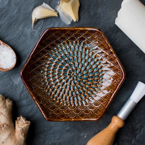 Tortoise- The Grate Plate Ceramic Grater 3 Piece set: Ceramic Grating Plate, Garlic Peeler and Wooden Handled Gathering Brush