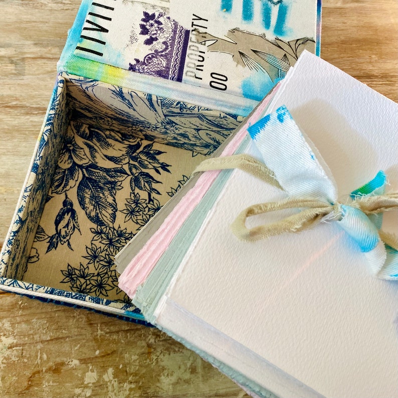 Sketch box, 100 pages for daily sketches. Book box, recycled mixed media fabric, embroidered. Papers: watercolor handmade kraft. Gift artist image 5