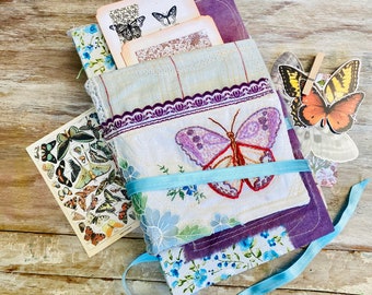 Butterfly junk journal, handmade journal. Imaginary insect, fabric embroidered notebook. Art journal, scrapbook, grunge, patchwork, textile