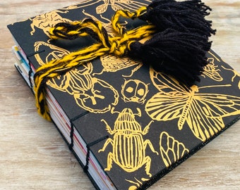 Handmade Junk journal. Black and gold. Art journal, hard cover. Gothic style. 365 pages. Woman wizard. Grimoire, dream book, magic notebook.