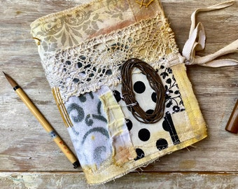 Handmade junk journal. Empty art journal. Soft covers with recycled embroidery. Creative art journal. Artistic pages. Rustic, grungy, chubby