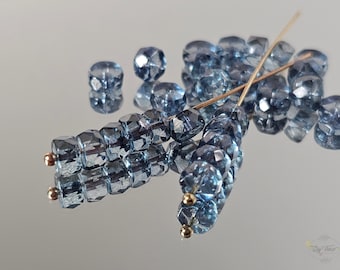 Lumi Blue Czech Glass Beads: Faceted Rondelle Heishi, 6mm, 20 Pieces