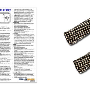 May include: A set of two black and white pool cue tips. The tips are made of a textured material and are designed to improve accuracy and control when playing pool.