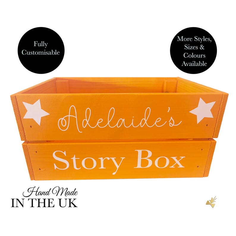 May include: Orange wooden story box with white text that reads "Adelaide's Story Box." The box has white star accents and the text "Fully Customisable" and "Hand Made IN THE UK" is also visible.