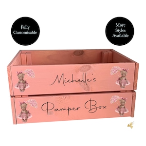 May include: Pink wooden crate with a personalised inscription "Michelle's Pamper Box". The crate is decorated with a repeated image of a teddy bear wearing a pink tutu and holding a pink umbrella.