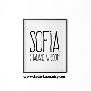 May include: Black and white printable art print with the name "Sofia" in a handwritten font and the text "(Italian) Wisdom" below. The print has a black frame and the website www.LetterLuxe.etsy.com is printed below the frame.
