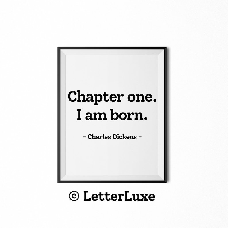 May include: Black and white printable quote art featuring the text "Chapter one. I am born." attributed to Charles Dickens. The quote is framed in a black frame and the copyright symbol and "LetterLuxe" are printed below the quote.