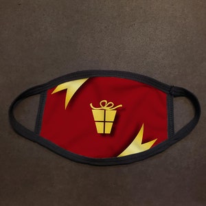 Máscara de cara de regalo de oro