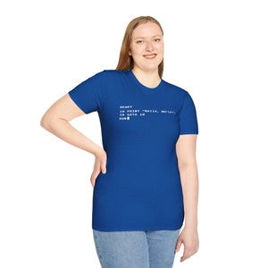 May include: A royal blue t-shirt with a white graphic of computer code that reads: READY 10 PRINT "Hello, World!" 20 GOTO 10 RUN