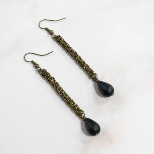 Very long bronze tube earrings with jet black teardrop bead, Simple rustic metal drop earrings, Beaded earrings for women