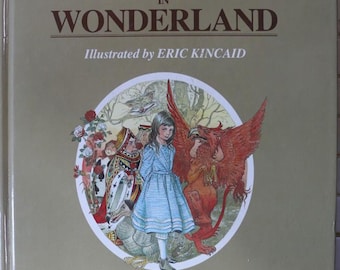 May include: A hardback book titled "The Original Alice in Wonderland" illustrated by Eric Kincaid. The cover shows Alice in a blue dress, a red griffin, and other characters in a circular illustration. The author's name, Lewis Carroll, is at the bottom.