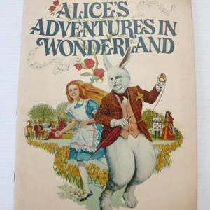 May include: A rustic wooden sign with the text "Welcome to our home" in white lettering. The sign features a distressed finish and a simple, inviting design, perfect for entryway decor.