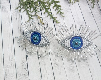 Blue beaded evil eyes with silver eyelashes earrings Trendy jewelery