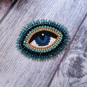 Evil eye brooch Blue beaded eye Embroidered brooch Big crystal eye Eye pin