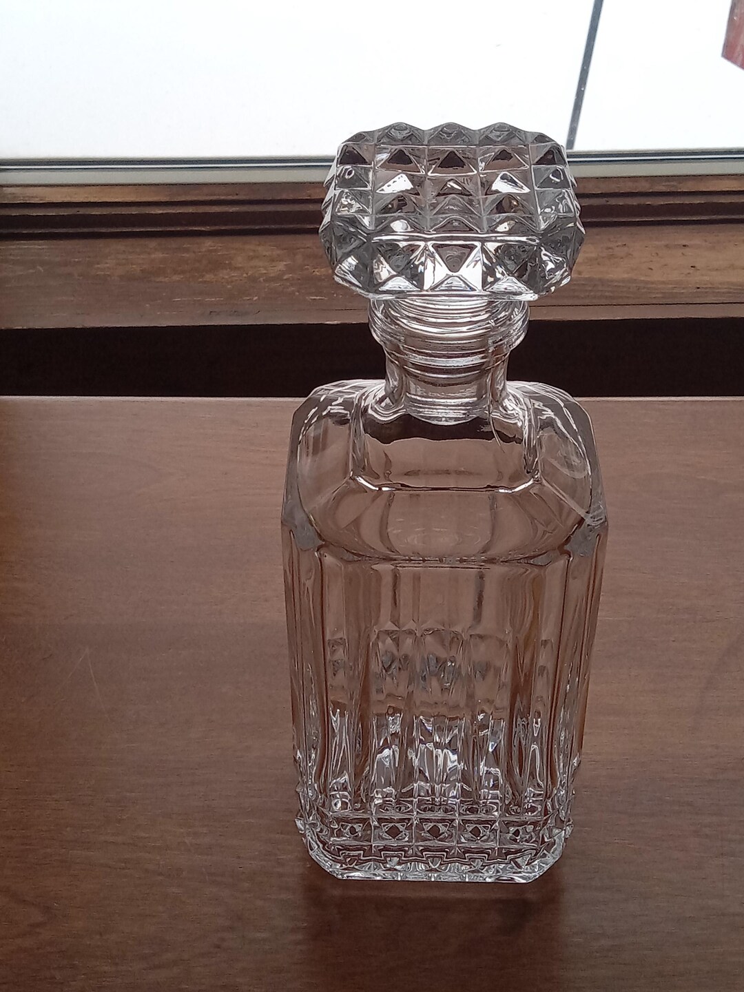 Classic crystal decanter, a metaphor for the classic structure needed in a perfect NFL Week 8 print schedule